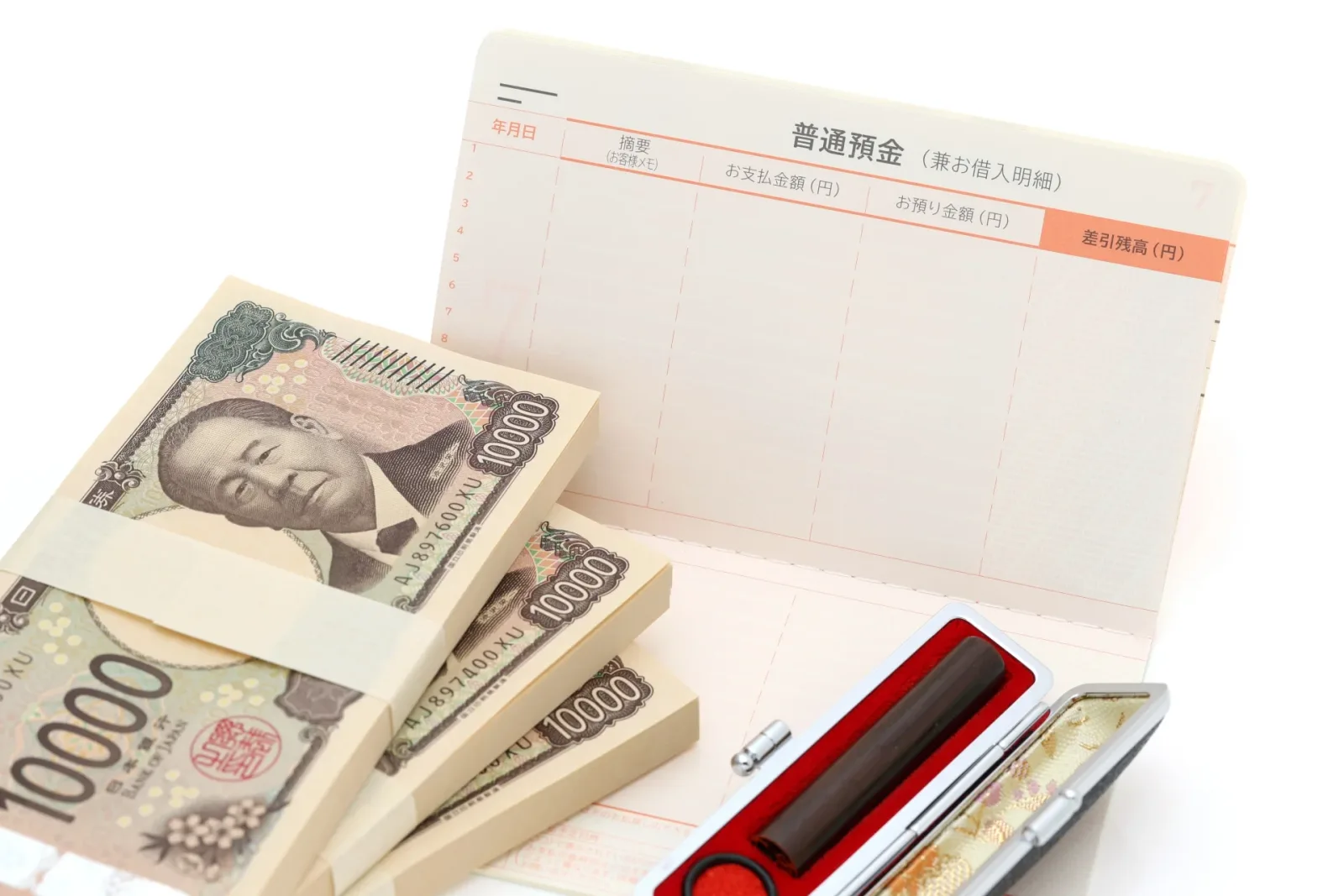 通帳とお金(空き家に関する記事のイメージ)